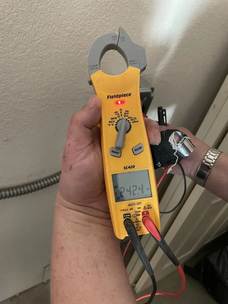 Voltage testing with clamp meter during Outlet Installation in Universal City
